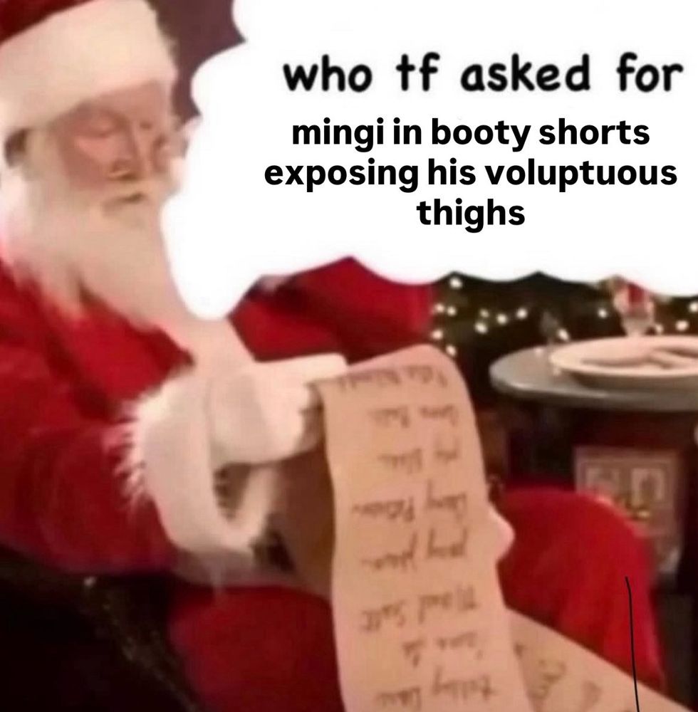 a picture of santa reading a list and saying “who tf asked for mingi in booty shorts exposing his voluptuous thighs”