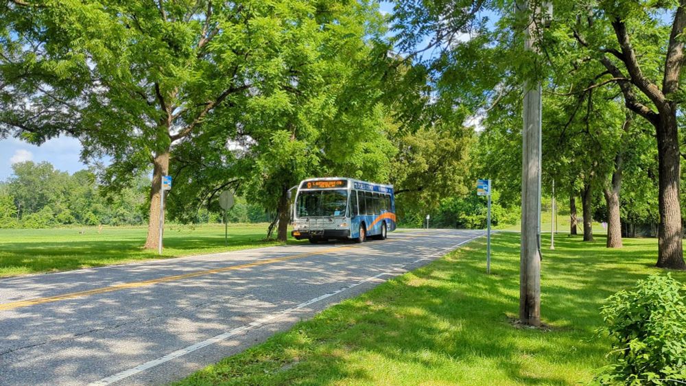 Route D bus approaching stop