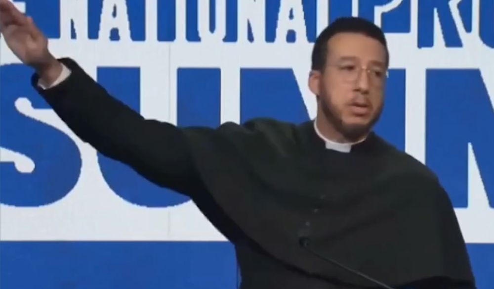 priest nazi salute