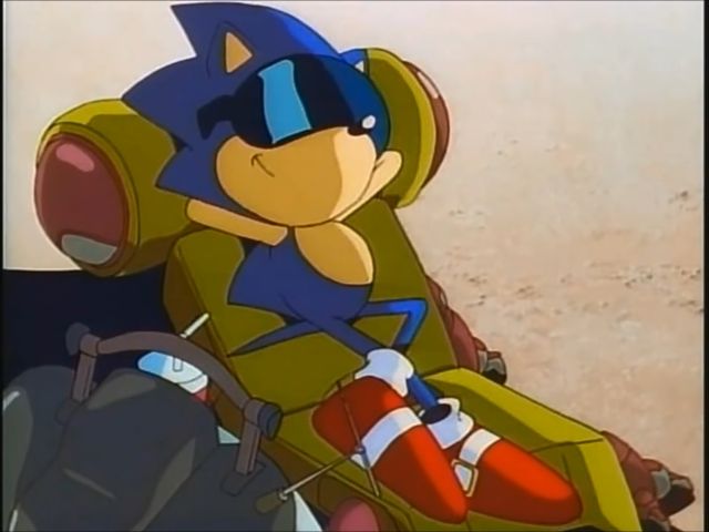 sonic relaxing on a beach chair with sunglasses on