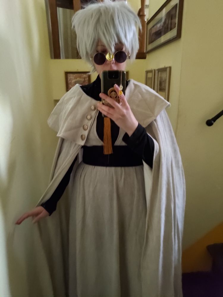 Picture of me in cosplay of Qifrey from Witch Hat Atelier (only the hat is missing)