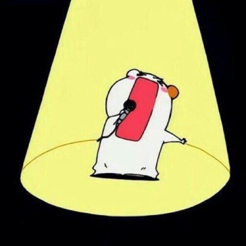 A cartoon hamster has a spotlight cast on them as they are shout/singing into a microphone.