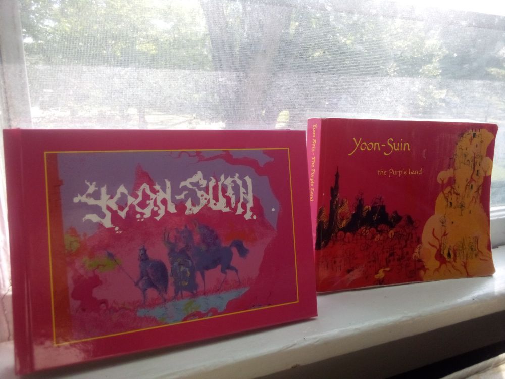 the new hardcover copy of yoon-suin next to my decade-old print-on-demand copy from lulu