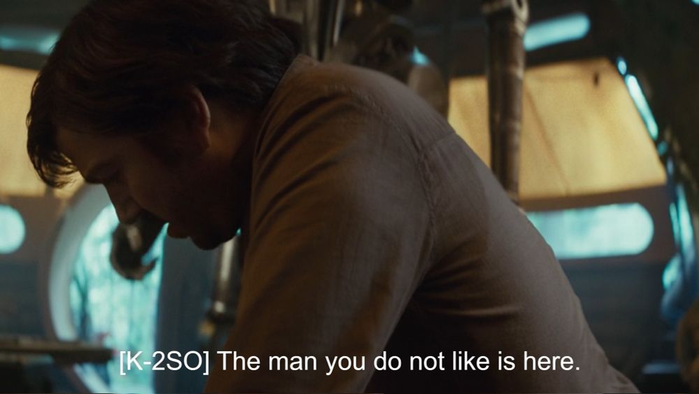 Still image from Andor Season 2 Episode 12. K-2SO tells Cassian that “The man you do not like is here.” Bail Organa is waiting at the door.