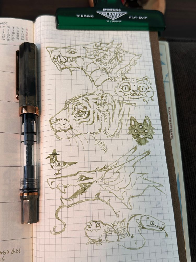 Various fountain pen ink creature doodles, dragons, tigers, toad, snake, crow and tiger from Kpop demon hunters and a bargling 