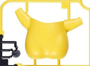 Cropped and rotated version of the image from the quoted skeet.  Zoomed in on the plastic piece for the back of the Pikachu and his juicy yellow buttocks.