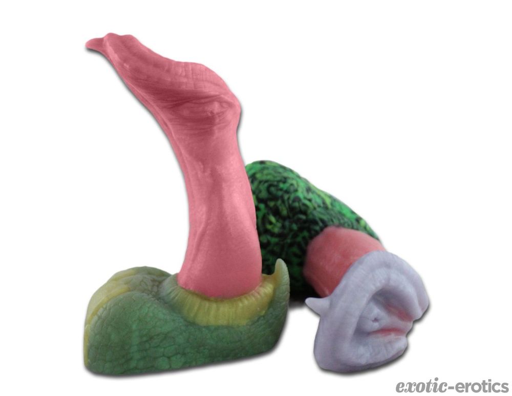Two Archie toys, one standing, one lying, in their signature colors, Coral Reef and Sea Glass.