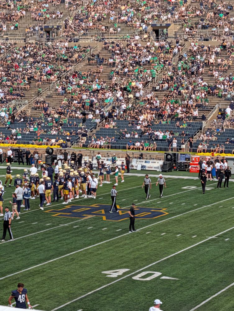 Pregame midfield at Notre Dame-Purdue. A bunch of giant men preparing for brain damage 
