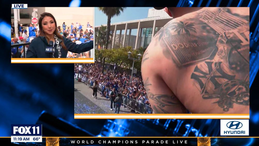 anthony banda's back tattoos, featuring the dodger stadium sign, the yankees logo, and the pirates logo