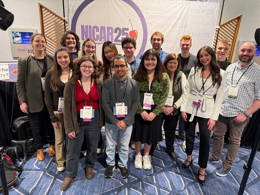 Twelve students from the Arnolt Center for Investigative Journalism at Indiana University stand with faculty and staff at the 2025 NICAR conference. 