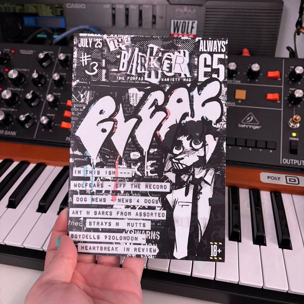 ceej holding a copy of the barker “bleak” issue