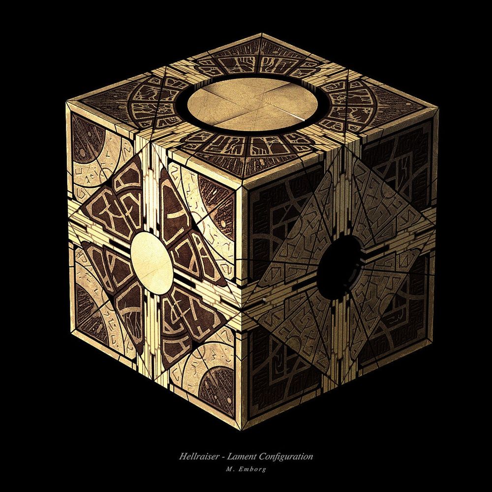 The Lament Configuration from Hellraiser. Its an intricate puzzle box with geometric designs in golds, browns, and black