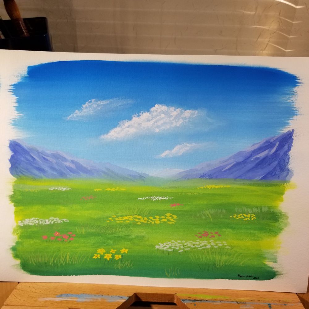 A gouache painting of a meadow with yellow, white, and red flowers. Purple mountains in the background and three clouds float in the sky.
