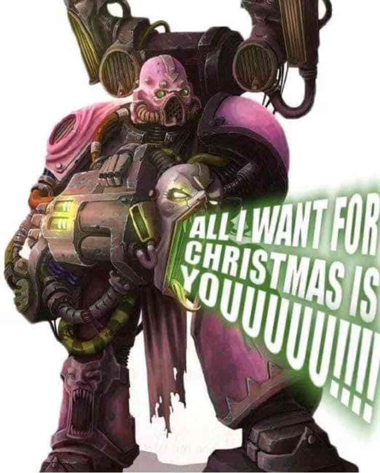 A garish, pink and black powered armor figure with a noise cannon blaring a suitably awful attack on one's senses - "All I Want For Christmas Is You" by Mariah Carey 