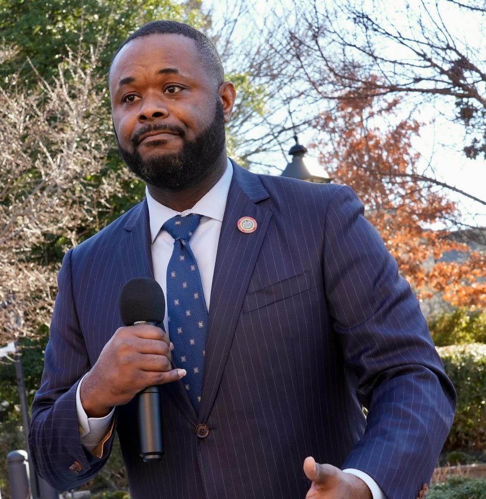 Senator Cory McCray speaks into a microphone outside the Maryland State House during our Transit Riders Rally on February 4th.