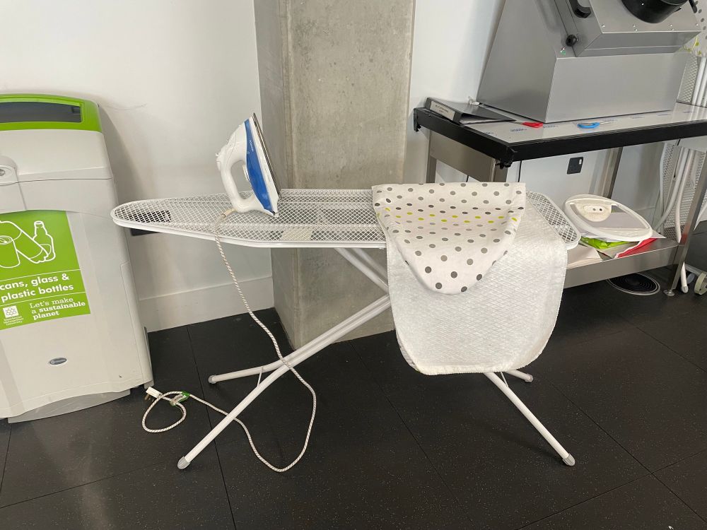 An ironing board with an iron 