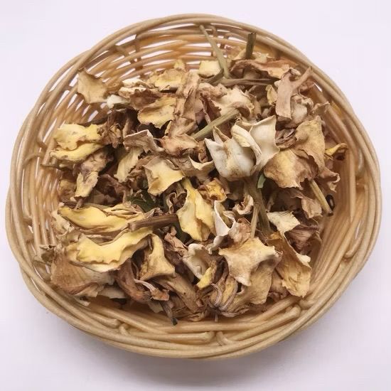 Pictured is a basket of dried gardenia flower petals. 
