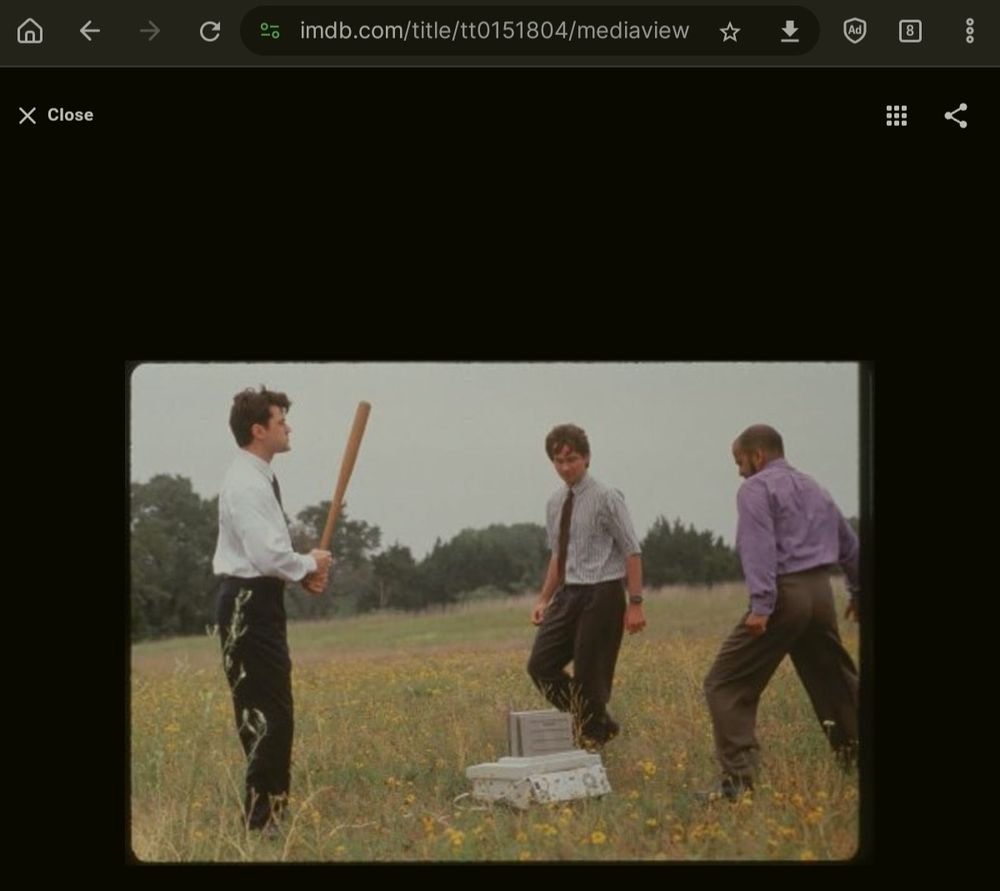 Screenshot of an IMDB.com page showing a still from the movie Office Space.