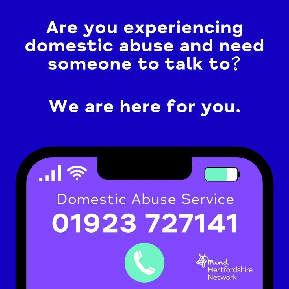 Image shows a phone screen with the Domestic Abuse Service phone number of 01923 727 141. The text reads "Are you experiencing domestic abuse and need someone to talk to? We are here for you"