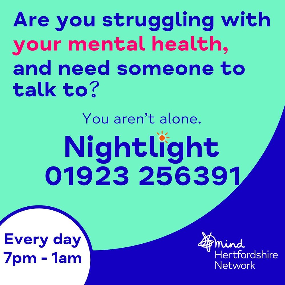 A turquoise and dark blue background. It reads: "Are you struggling with your mental health, and need someone to talk to? You aren’t alone. Nightlight 01923 256391." A white circle at the bottom left says "Every day 7pm – 1am." The Hertfordshire Mind Network logo appears in the bottom right corner.