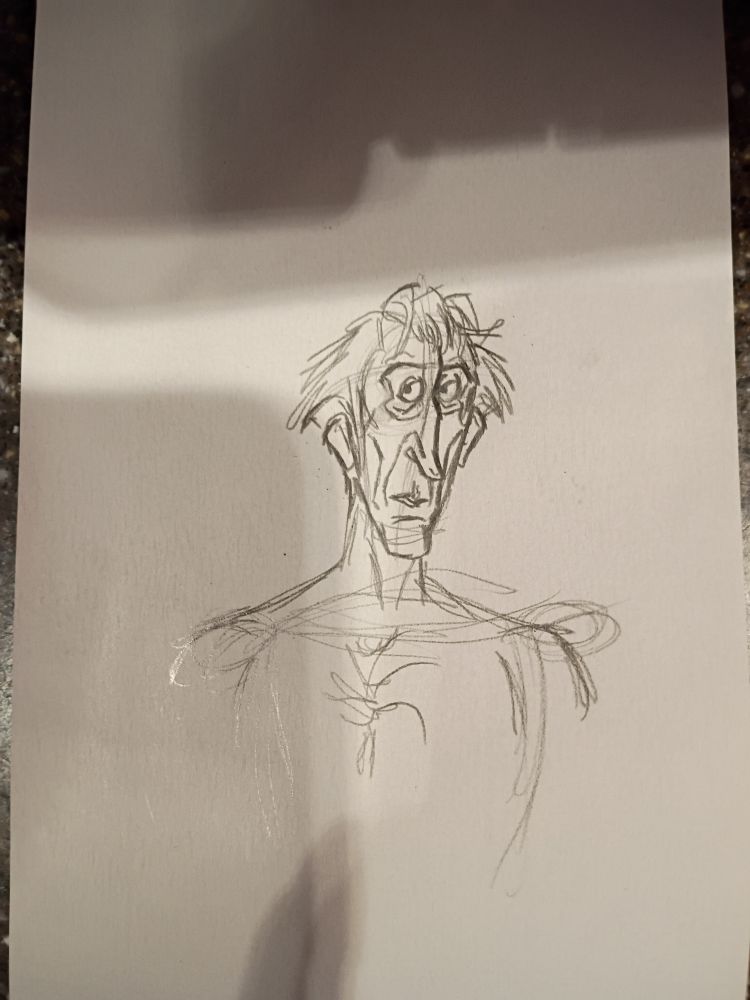 A bust of Frollo with his hair looking a bit messy and wild