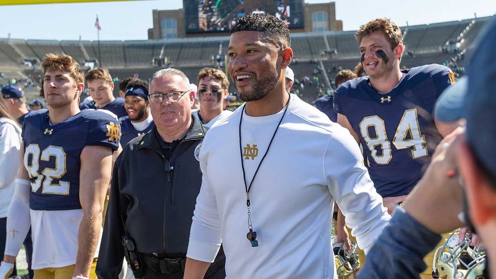 There are great expectations around the Notre Dame football program this season. Head coach Marcus Freeman led his team to a 14-2 record last season, and it seems quite likely that the Fighting Irish will be at the same level in the 2025 season. Notre Dame opens the season on the road against Miami, and Freeman still has not decided on his starting quarterback. With three weeks to go before that opening game in South Florida, redshirt freshman CJ Carr and sophomore Kenny Minchey are in a tight battle to see who will be under center in that game. At this point, it looks like both quarterbacks are performing extremely well, and they appear to be pushing each other on a regular basis. In addition to throwing the ball well, both players seem to have excellent leadership skills and have something of an aura about the way they carry themselves and attack the job. It's clearly a good problem for Freeman to have since the competition is bringing out the best in both quarterbacks. Whether it's Carr or Minchey that gets the tap on the shoulder from the head coach, the winner will have a chance to grab hold of the starting position and put his stamp on it if he can lead Notre Dame to a season-opening win and do it in impressive fashion. Notre Dame's second game is two weeks later at home against Texas A&amp;M, and earning the starting position and holding on to it for a couple of weeks would go a long way towards cementing the position for a full season. Notre Dame's offense appears stellar Michael Caterina-USA TODAY SportsWhile there may be a quarterback battle this summer, it appears that Freeman will have an elite offense this season. Jeremiyah Love appears to be one of the best running backs in the country. He carried the ball 183 times last season and gained 1,162 yards while scoring 17 touchdowns. He also gets the job done as a receiver after catching 28 passes for 237 yards and two touchdowns last year. In addition to Love, they also have Jadarian Price, who should also be a key contributor. He rushed for 787 yards last season while averaging 6.2 yards per carry and scoring seven touchdowns. Malachi Fields should be the team's top receiver after transferring from Virginia last season. He has the size that pro scouts are looking for at 6-4 and 220. He has a huge wingspan, and he can catch anything he can reach. Fellow wideout Will Pauling should be an excellent complement to Fields after transferring from Wisconsin. More NCAA Football NewsNCAA FootballDid Jim Knowles take shot at Ryan Day, Ohio State’s culture?Lorenzo J Reyna · 23 minutes agoNCAA FootballTar Heels tabbed as ‘biggest mystery’ in CFBJake Faigus · 37 minutes agoNCAA FootballExclusive: 2028 California QB eyeing Texas Tech, SMU as recruitment heats upLorenzo J Reyna · 1 hour agoNCAA FootballTexas Tech lands No. 1 player for 2027 classLorenzo J Reyna · 2 hours agoHBCUTony Carter, Central State add more NFL experience to coaching staffRandall Barnes · 2 hours agoNCAA FootballHow Nick Saban, Pete Carroll shaped Texas football’s Steve Sarkisian as a coachScotty White · 2 hours agoSubscribe To Our Newsletter