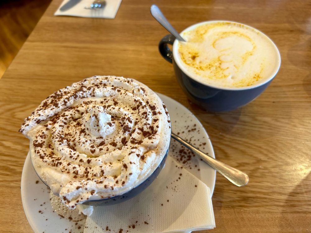 Tiramisu latte and golden milk latte (ginger & tumeric tea + steamed milk)