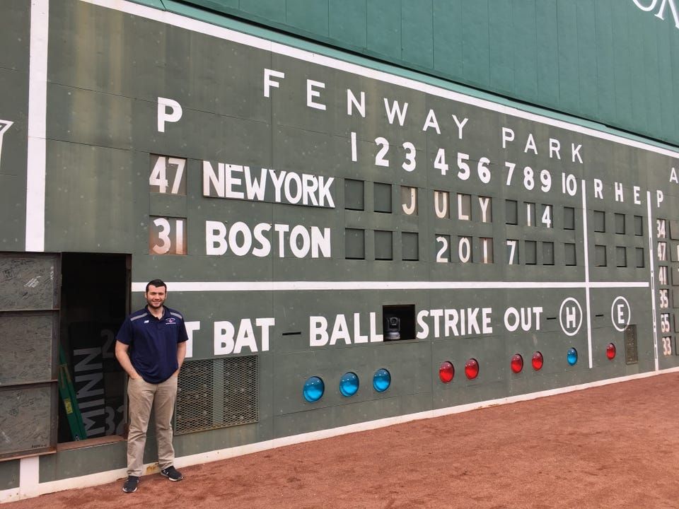 Fenway scoreboard and the scorekeeper.