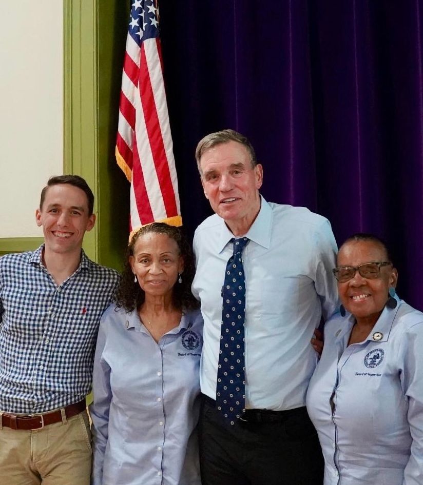Posed photo of mike with Sen. Mark Warner and Prince Edward County Supervisors Pride and Cooper-Jones