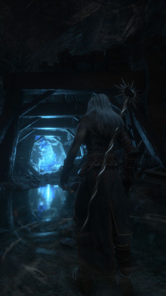 Rook in the Deep Roads near the Kal-Sharok outpost. Blue lyrium crystals are glowing at the end of a man-made tunnel.