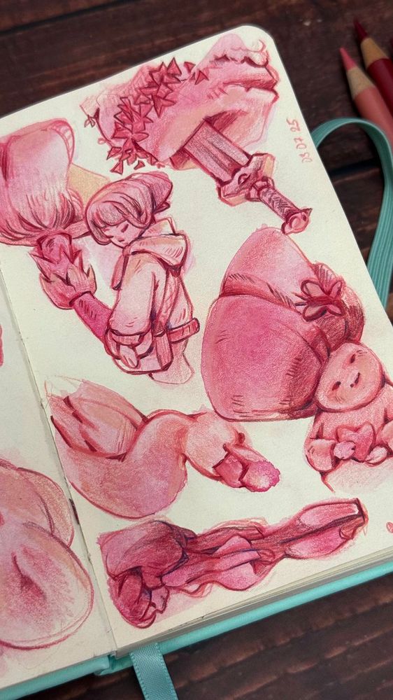 An open sketchbook with pink sketches of a girl, mashroom, bird, sword.