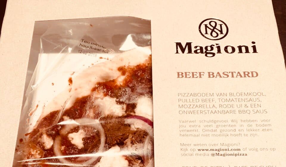 A pizza with the words BEEF BASTARD on it.