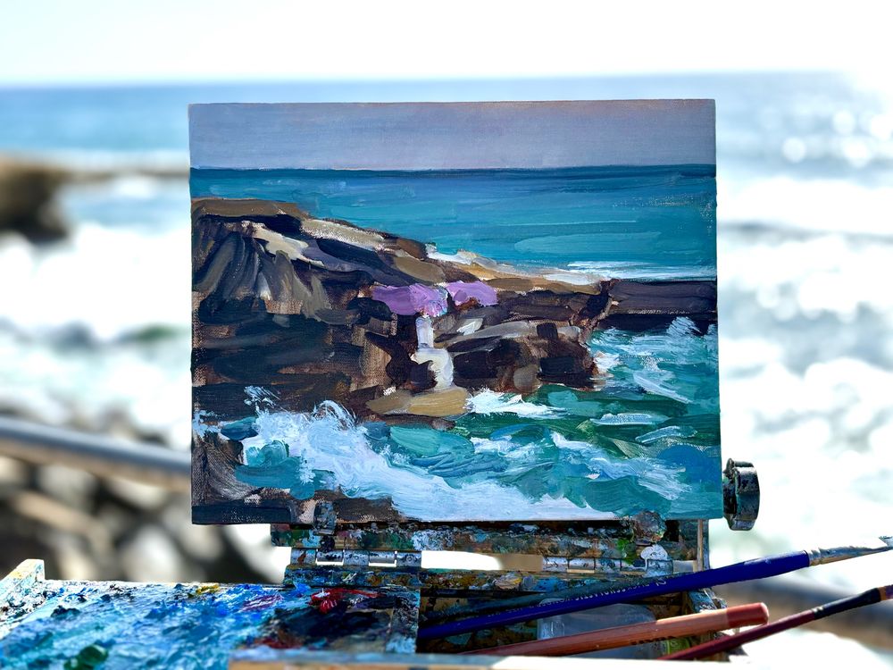 Painting of rocks and surf 