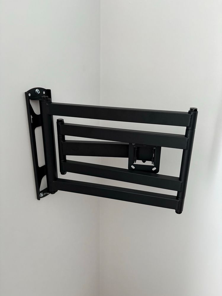 Picture of a tv wall bracket installed, not hanging off or about to drop off