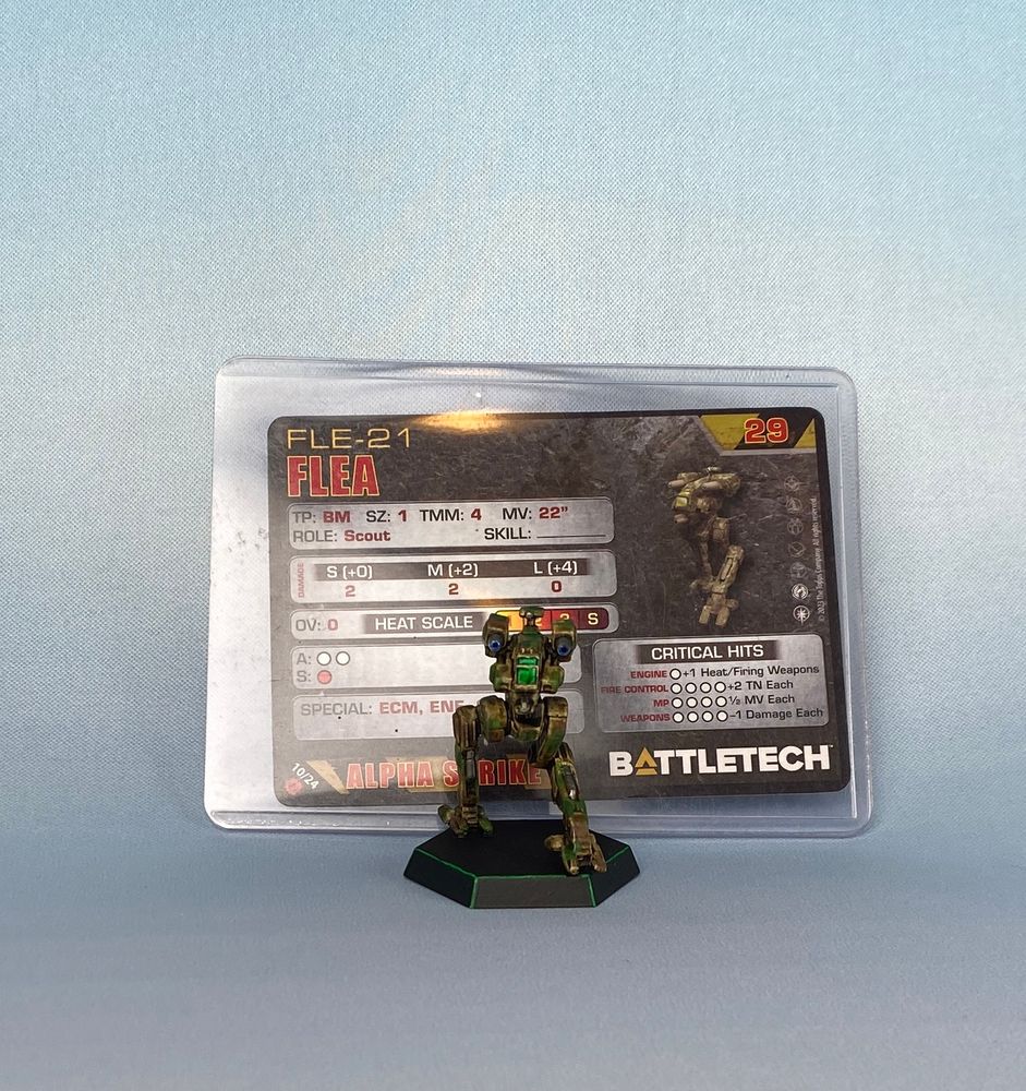 Flea battlemech painted green camouflage.