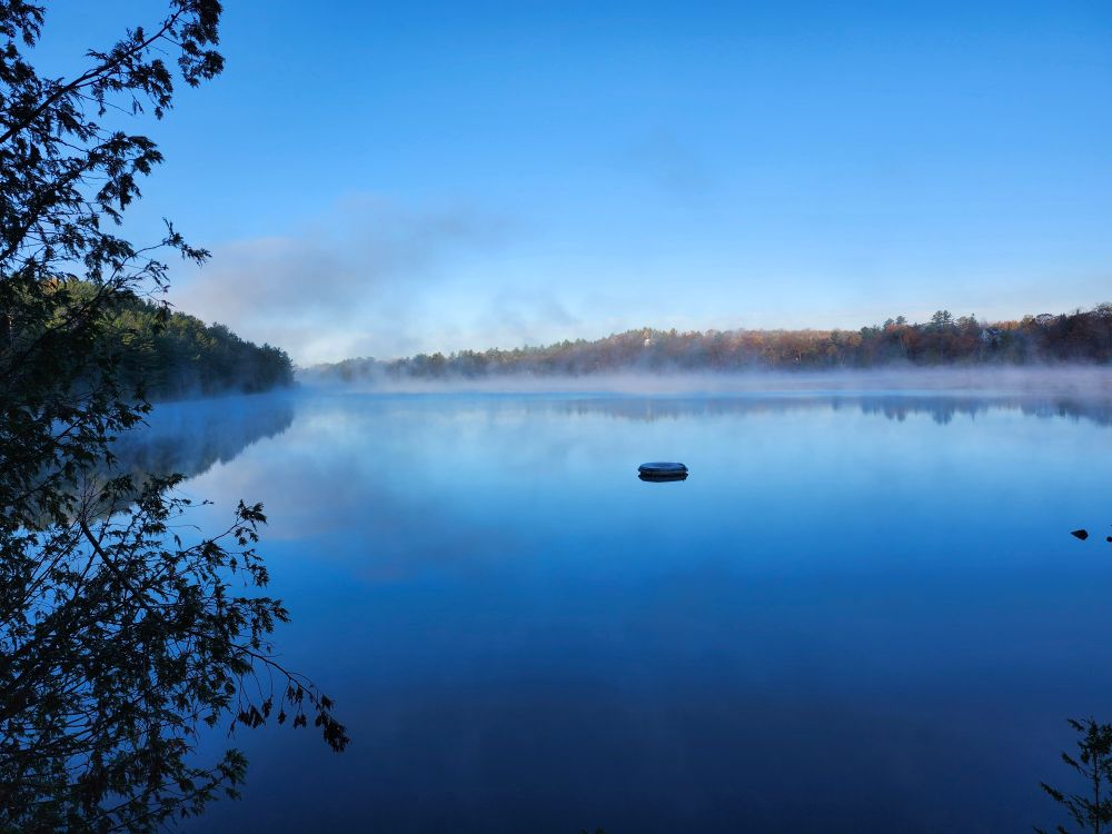 Morning fog on a lake in Northern Ontario.