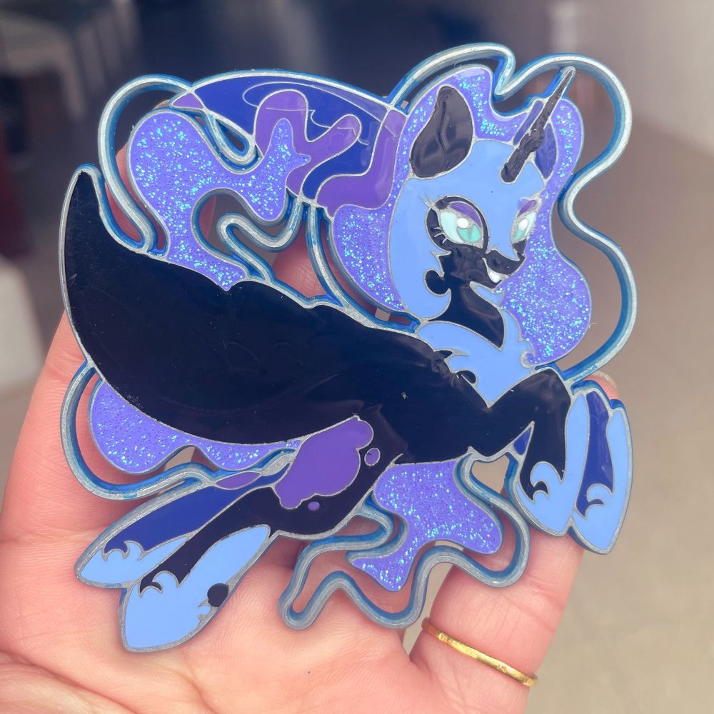 an enamel pin of nightmare moon from mlp, still a work in progress.