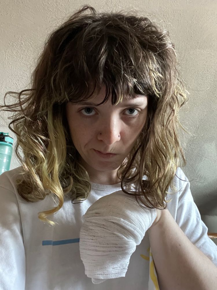 dog girl with injured paw looking helpless and vulnerable