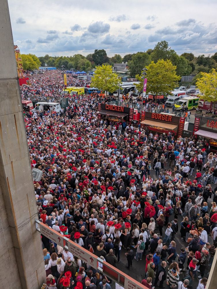 Looking down on the huge crowds outside Twickenham stadium at the rugby world cup final.
