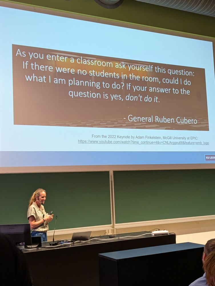 A photo of a PowerPoint slide on a screen in a lecture theatre. It reads: As you enter a classroom ask yourself this question: if there were no students in the room, could I do what I am planning to do? If your answer to the question is yes, don't do it.
