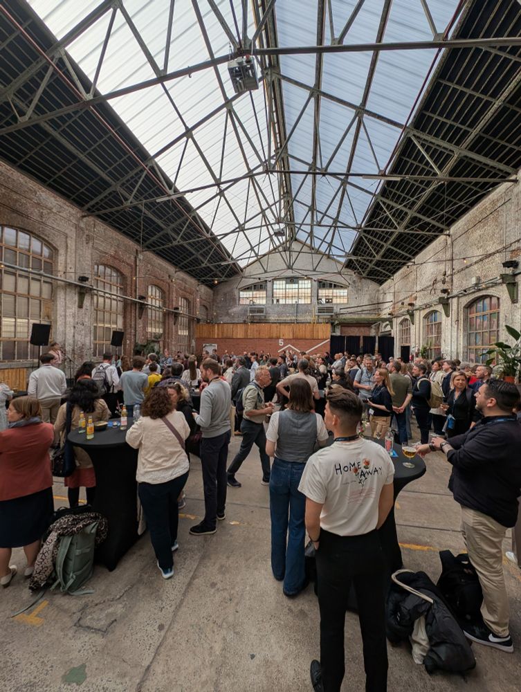 A photograph of Hal 5 with lots of people enjoying a drink.