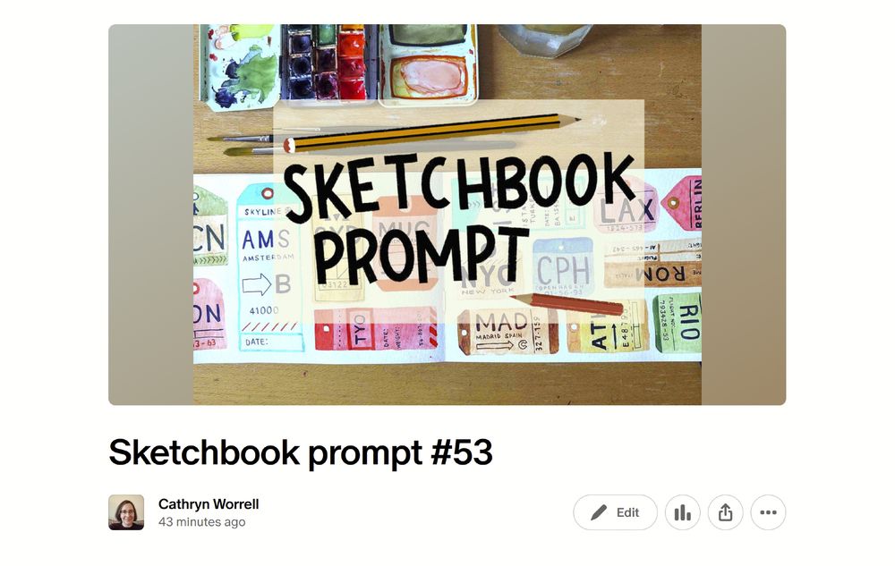 Image of a sketchbook and paints on a desk. The sketchbook is open to show watercolour illustrations across the double page spread. Overlaid text reads 'Sketchbook Prompt'.