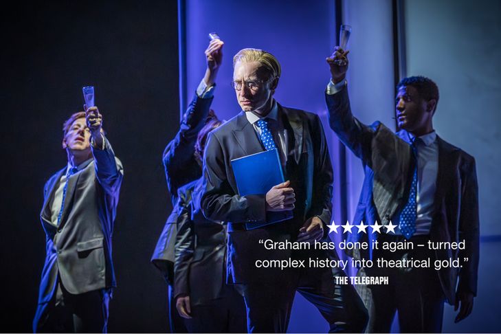A man stands holding a blue folder. Behind him, three men raise champagne flutes. There is text on top of it that reads '5 STARS - "Graham has done it again - turned complex history into theatrical gold." The Telegraph.'