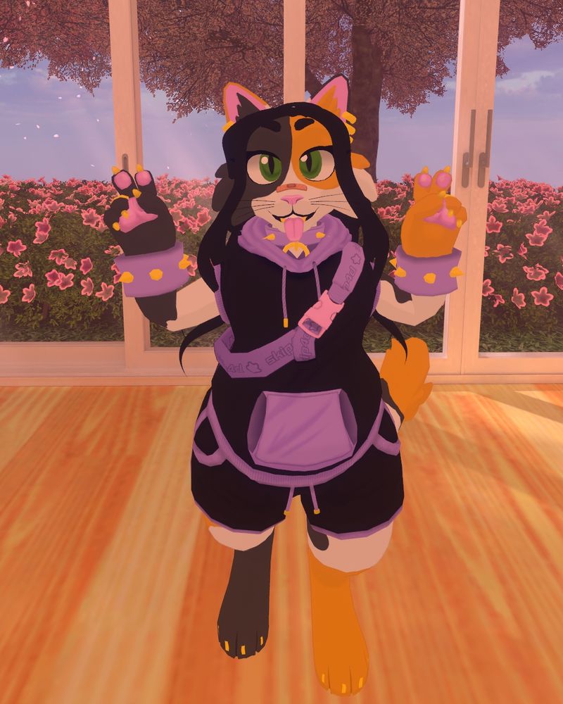 Letoshta in a black with purple outline shorts and sleeveless hoodie, she has purple cuffs with gold spikes, and a crossbody bag to match!