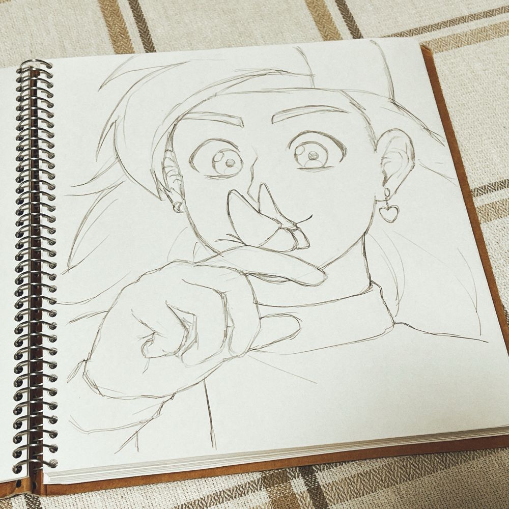 クロッキー帳に描かれたナイト・オブ・グィネヴィアのファンアート。指先に留まった蝶を見つめるフランキー。