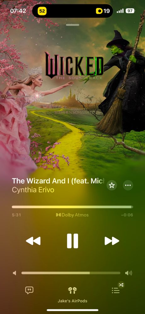Screenshot from the Apple Music app on iPhone showing the song "The Wizard and I" from the Wicked movie soundtrack playing.