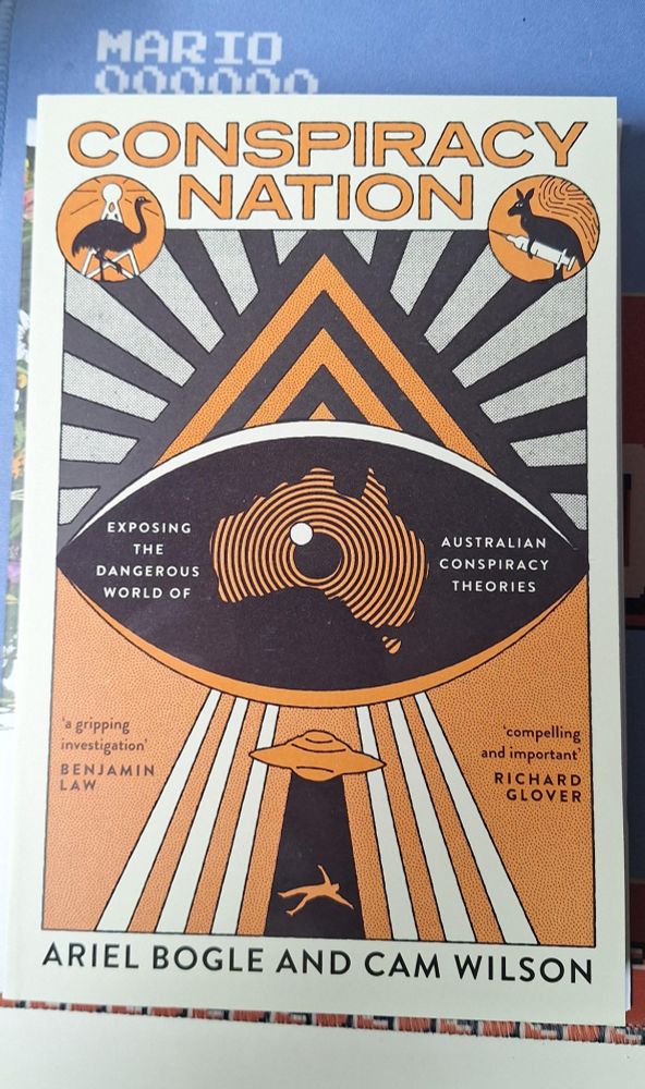 Book cover of Conspiracy Nation by Ariel Bogle and Cam Wilson.