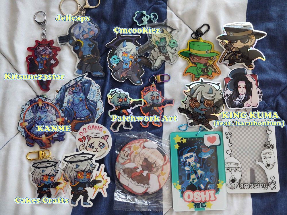 Assorted HC stickers and key chains continued, plus Johnny and Test, also including a large button and two acrylic photocard holders. One of them already has a MZD card inside.