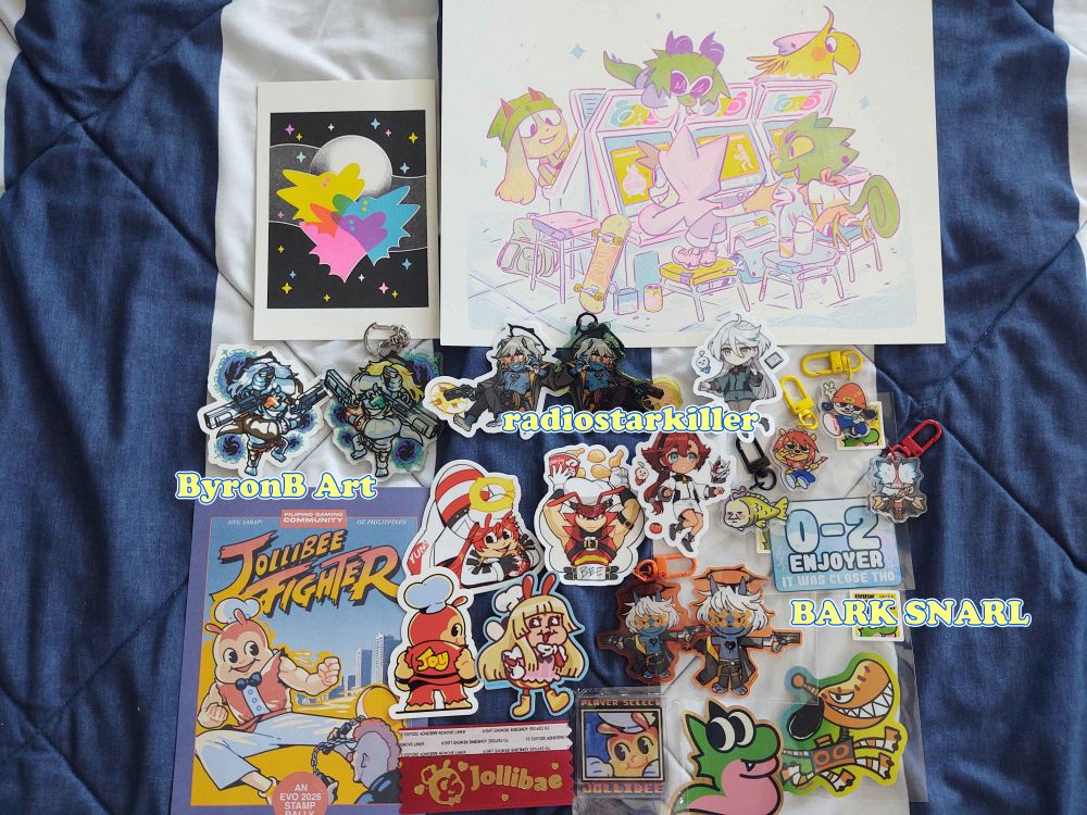 Even more assorted prints, stickers and acrylic key chains of various media, including Jollibee Fighter stamp rally goods.