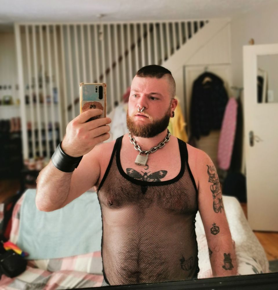 Mirror selfie of me I na black mesh tank top looking sweaty